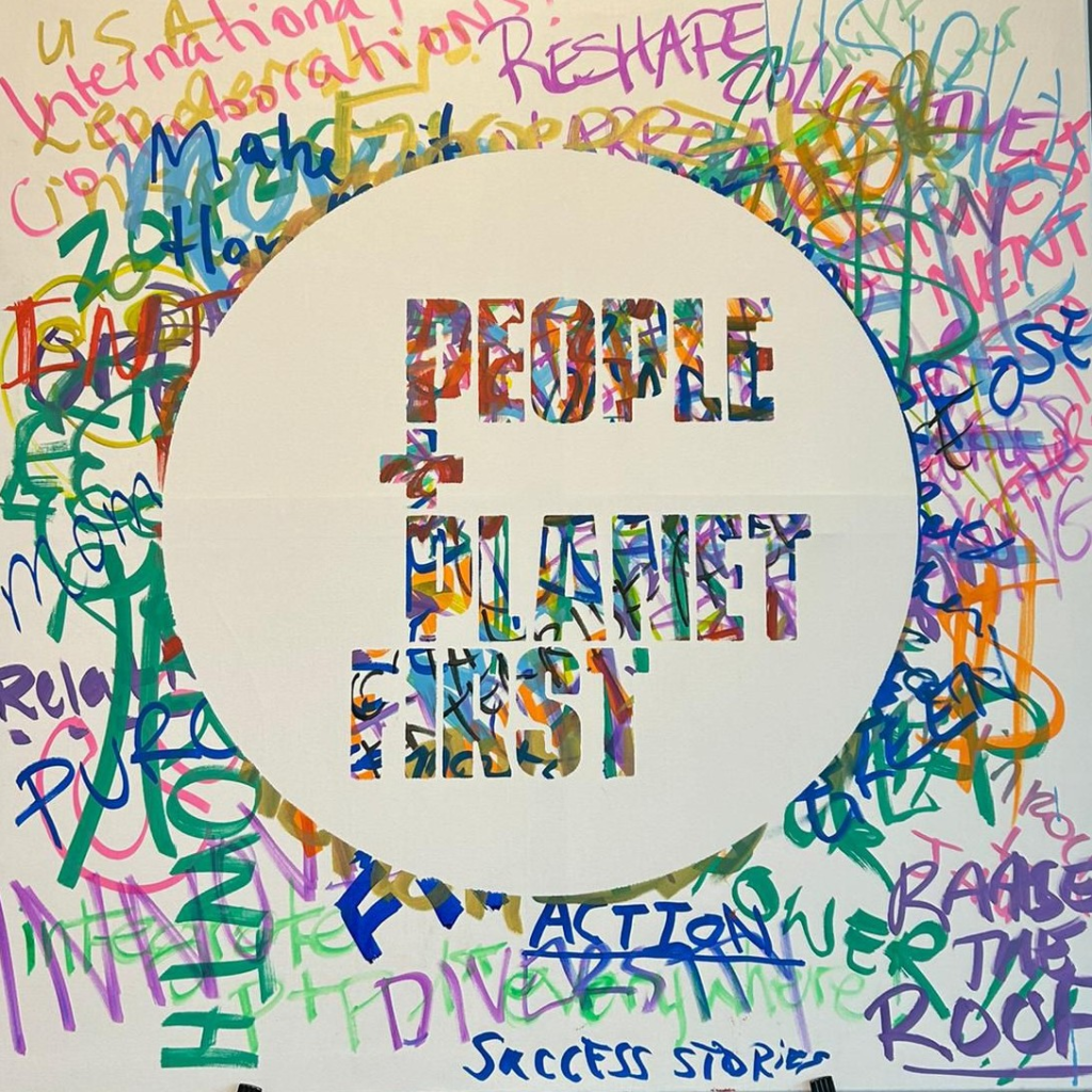 People and Planet First graffiti art